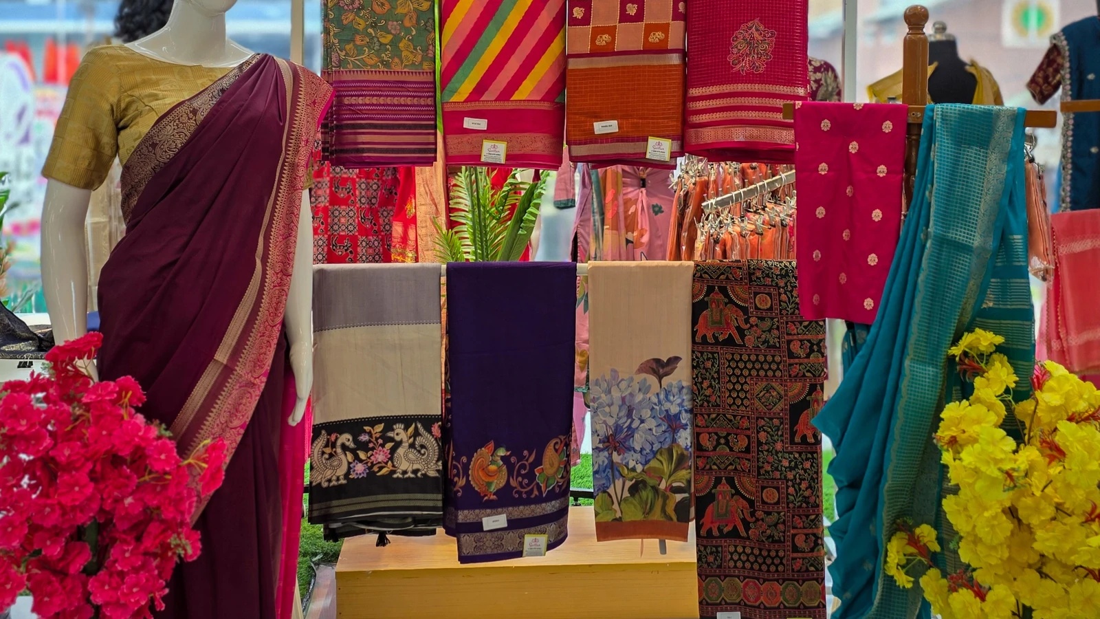 Curated garments on display at the Savitur showroom